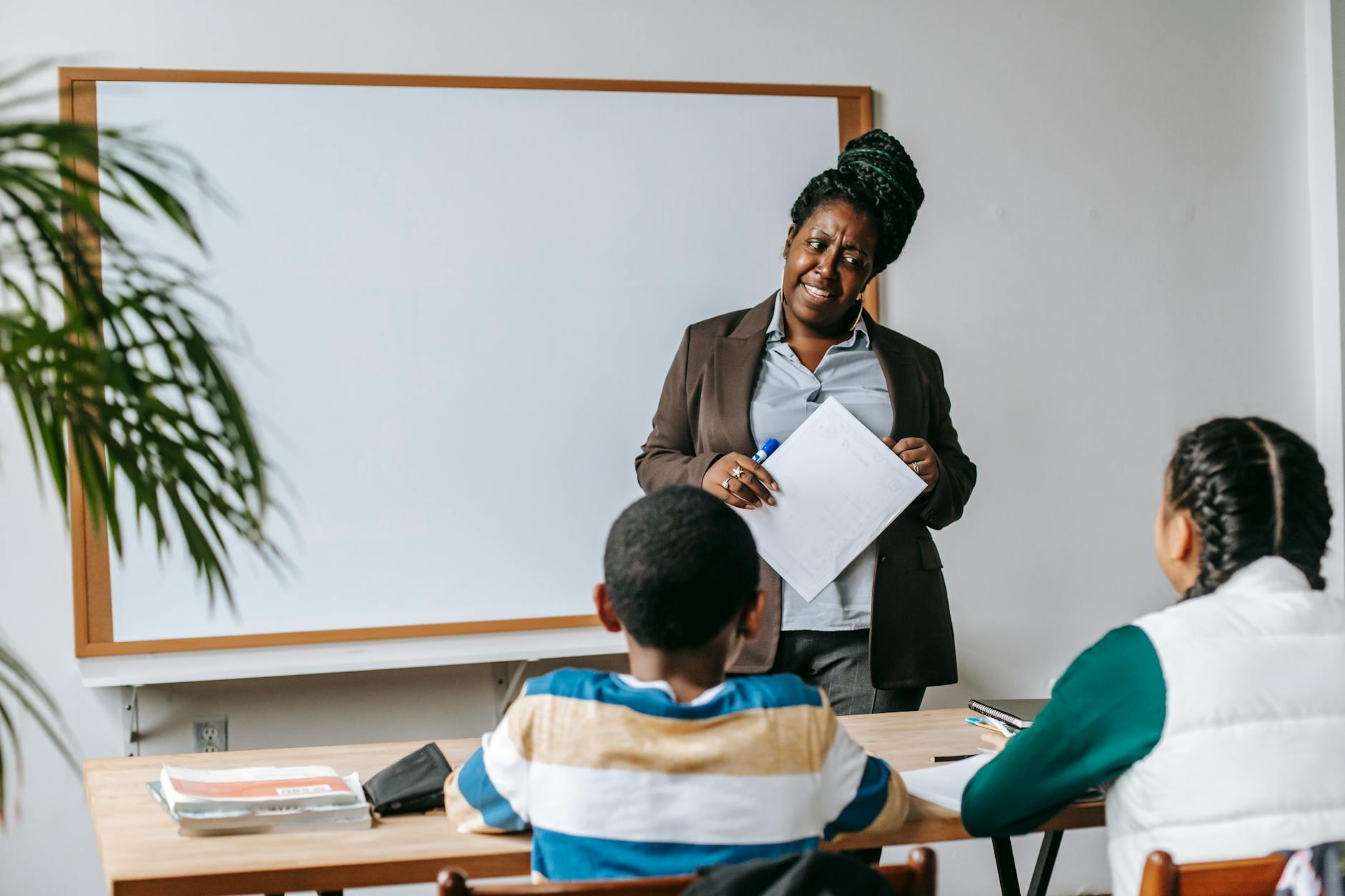 African American tutoring a child
